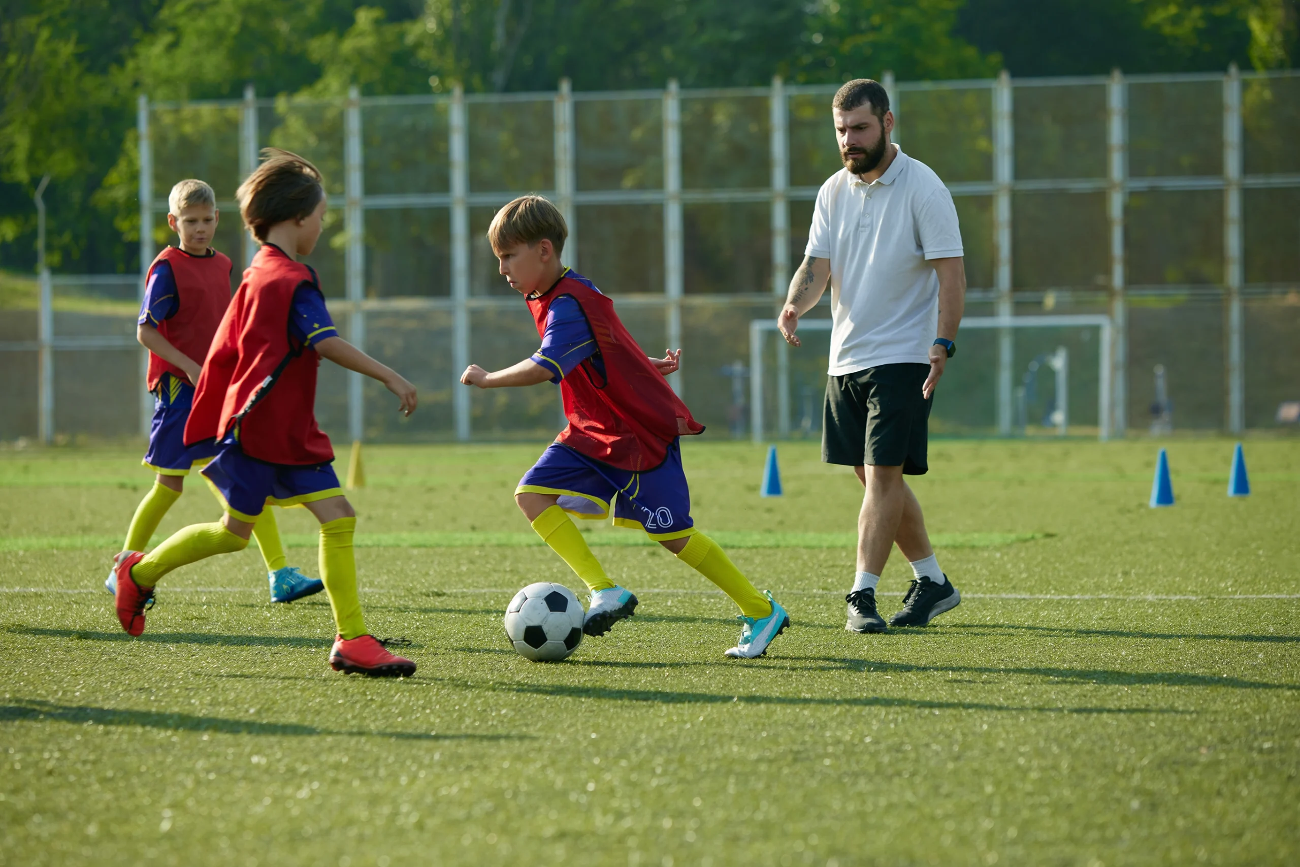 Soccer Coach Training Young Players